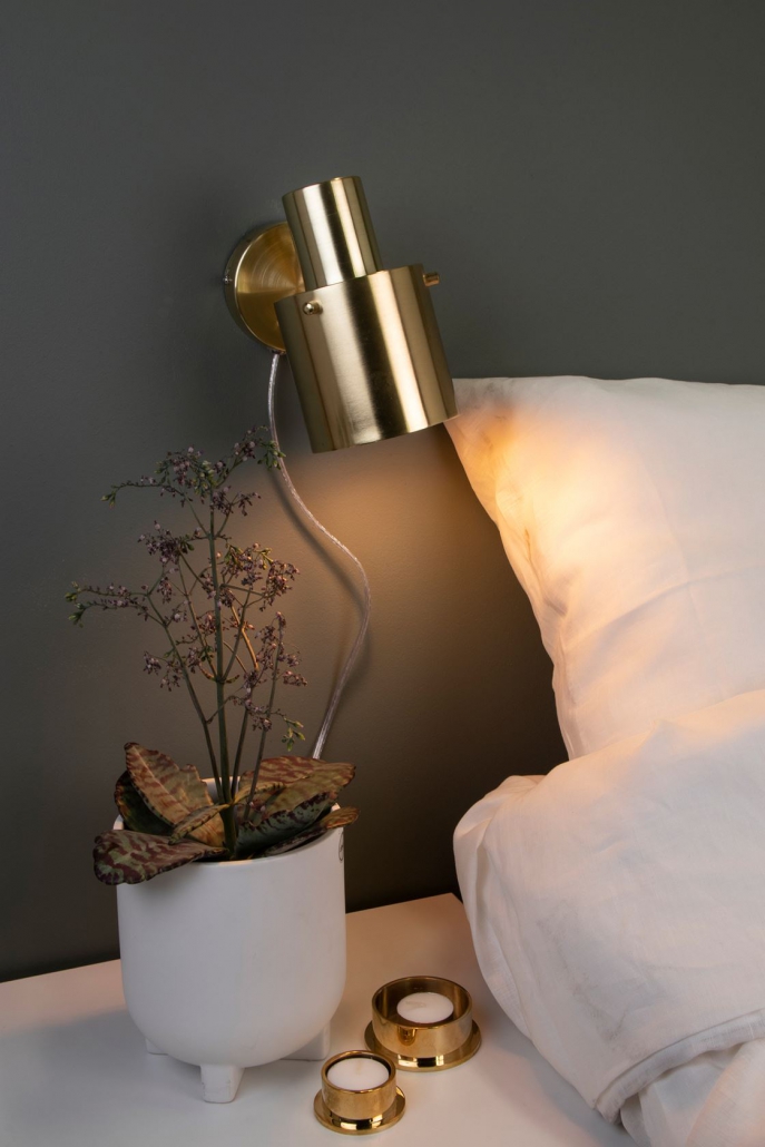 Minimalistyczny kinkiet do sypialni przy lozku - Globen Lighting