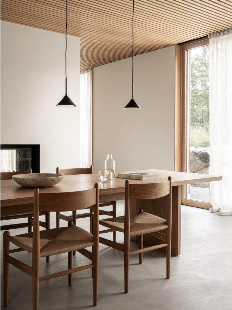 Minimalistyczne czarne lampy stożki nad stół styl japandi